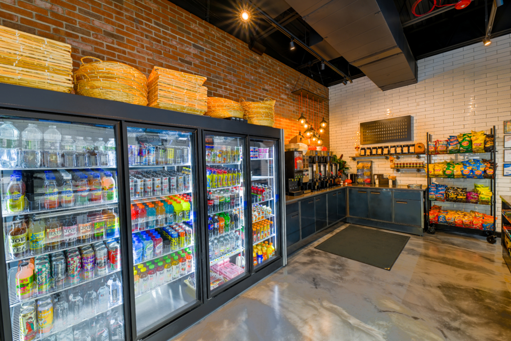 Professionally cleaned bagel shop with view of the drink cooler