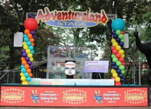 Adventureland charity presentation display for the Helping Hands Foundation