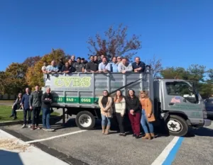 CVBS team posing on a service truck at Fall Harvest 2022