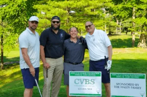 Four CVBS team members at a charity golf outing